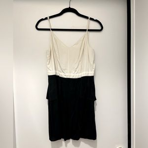 black and white dress with button detail on back. Size 6